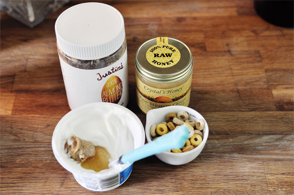 Best snack ever: plain greek yogurt, almond butter, raw honey and a few Cheerios. 
